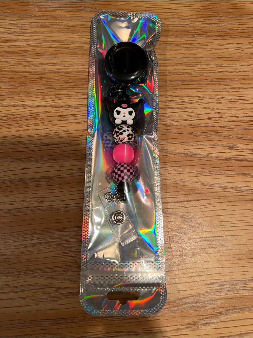 Custom badge reel. New in package